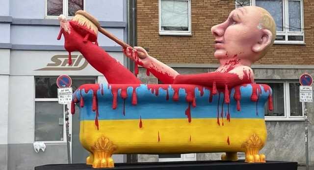 Путін у кривавій ванні і поцілунки з дияволом: війна в Україні стала головною темою карнавалів у Німеччині і Бельгії