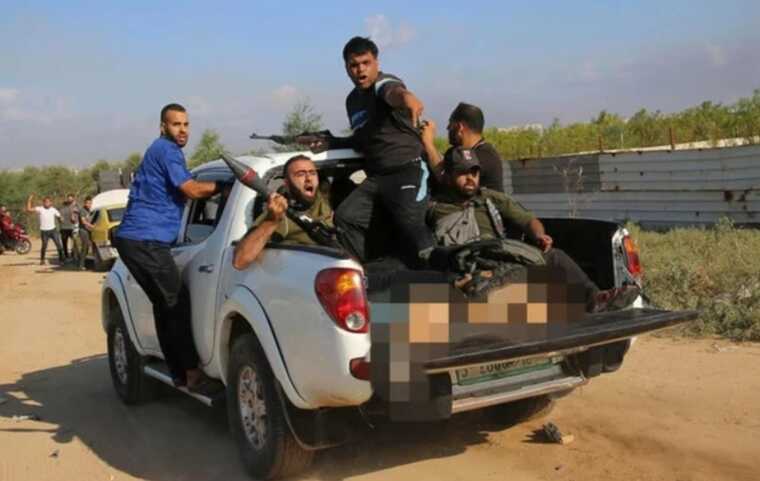 Скандал на Pictures of the Year: фото Associated Press з бойовиками ХАМАСу, які везуть тіло вбитої жінки викликало обурення у світі