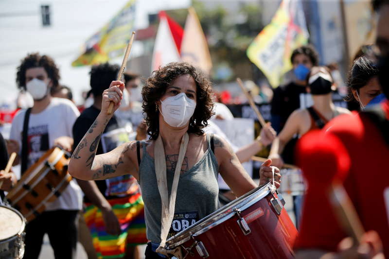 People participate in a protest against Brazils President Jair Bolsonaro and his handling of the coronavirus disease (COVID-19) pandemic in Cuiaba, Brazil, June 19, 2021. REUTERS/Mariana Greif